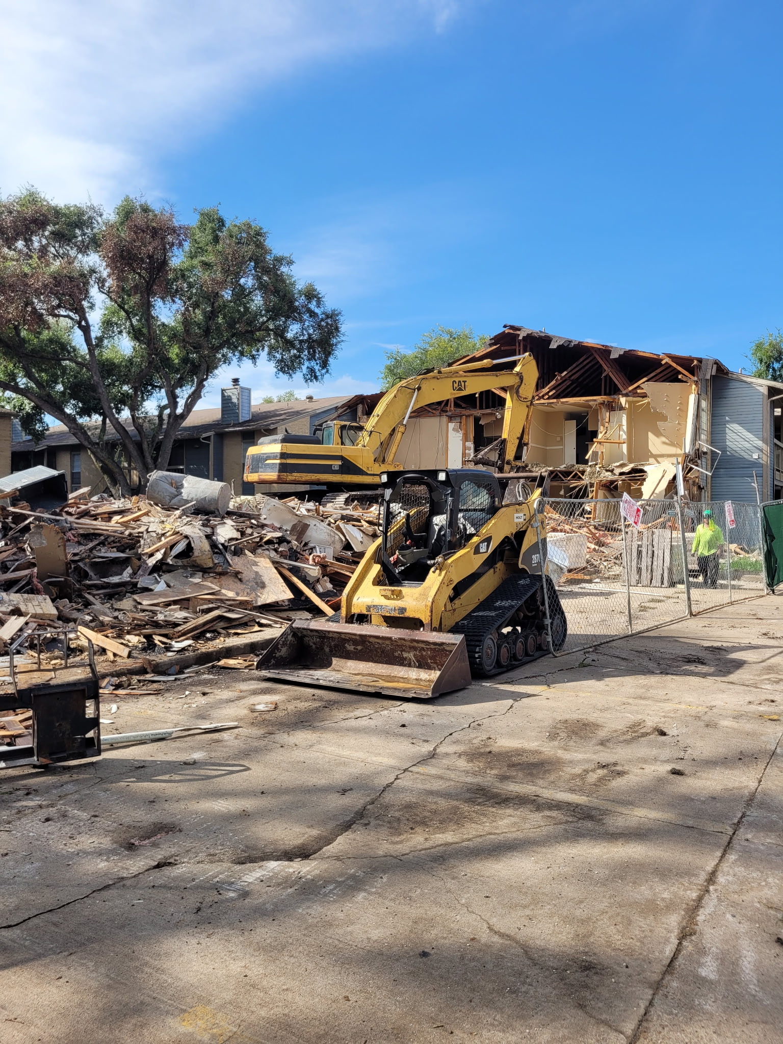 Demolition crew clearing a residential structure